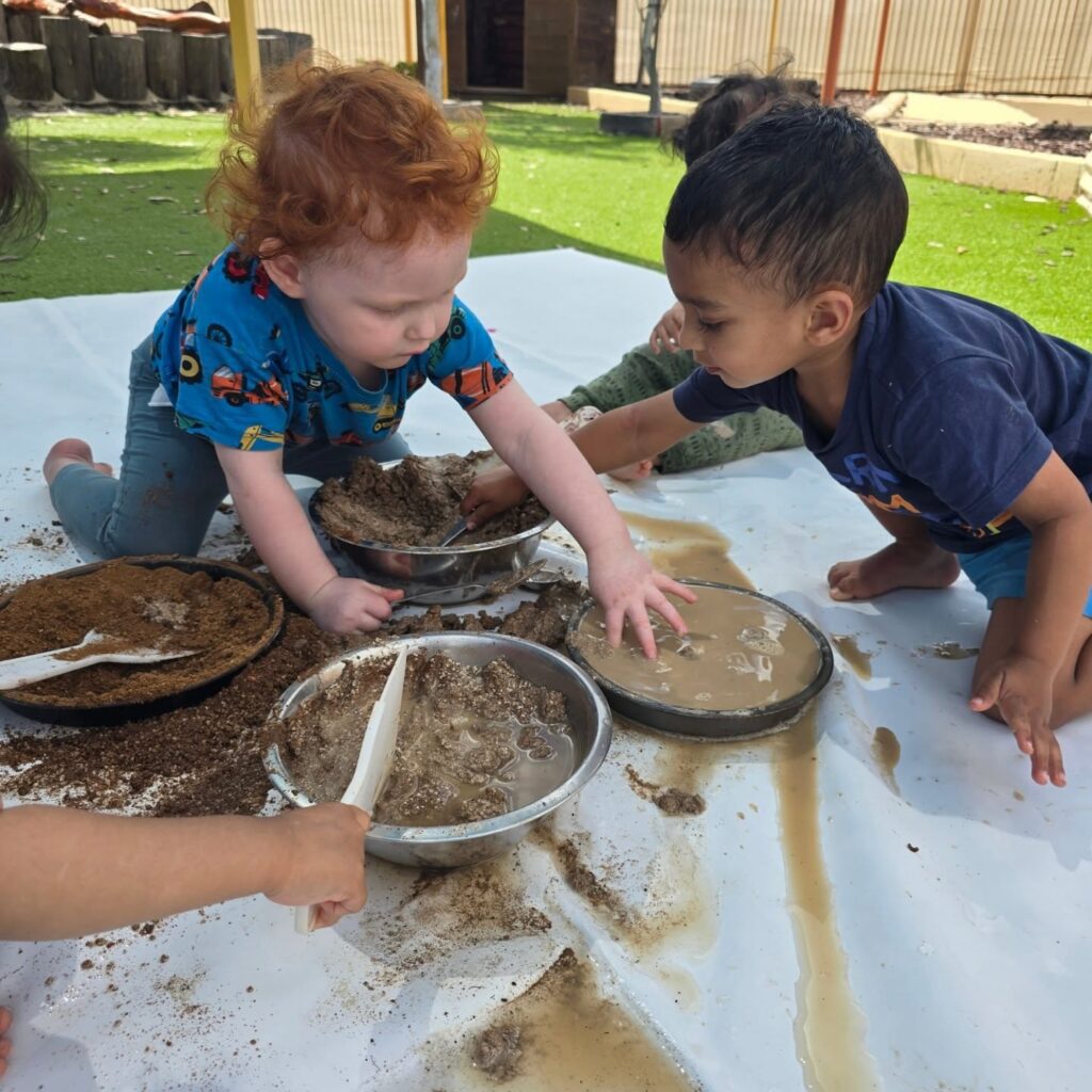 children playing with mud | Southern River Childcare