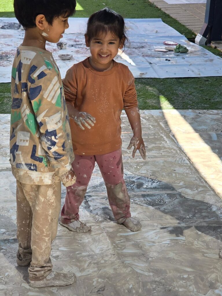 Daisy's Childcare Southern River children playing with mud